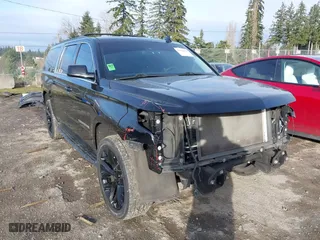2018 Chevrolet Suburban LT with VIN 1GNSKHKC4JR130845, listed as a IAAI auction lot 41623614 with 148,723 mi miles. Bid and sale history available at carsss.com. Image 1.