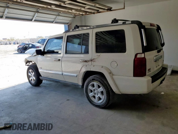 2008 Jeep Commander Limited with VIN 1J8HH58N28C130633, listed as a Copart auction lot 61009065 with 206,121 mi miles and Salvage title. Bid and sale history available at DreamBid. Image 2.