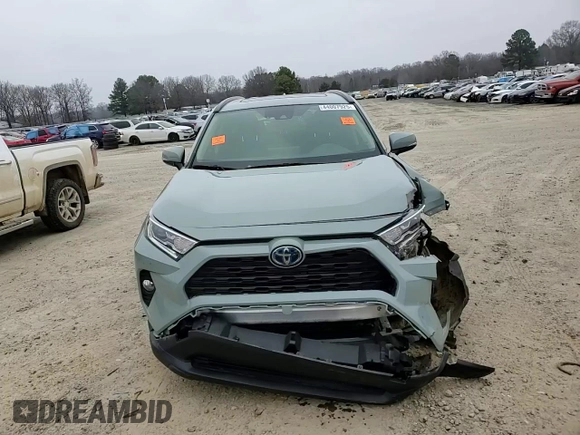 2019 Toyota RAV4 Hybrid XLE with VIN JTMRWRFV0KD011136, listed as a Copart auction lot 44007925 with 70,364 mi miles and Salvage Title. Bid and sale history available at carsss.com. Image 12.