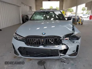 2023 BMW 3 Series 330i with VIN 3MW69FF01P8D33427, listed as a IAAI auction lot 42461734 with 15,587 mi miles and . Bid and sale history available at DreamBid. Image 12.