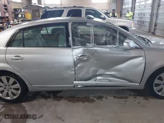 2005 Toyota Avalon XL with VIN 4T1BK36BX5U045813, listed as a IAAI auction lot 42061631 with 150,436 mi miles. Bid and sale history available at carsss.com. Image 13.