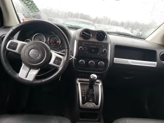 2015 Jeep Compass High Altitude Edition with VIN 1C4NJDEB0FD324538, listed as a Copart auction lot 69882692 with 101,068 mi miles. Bid and sale history available at carsss.com. Image 8.