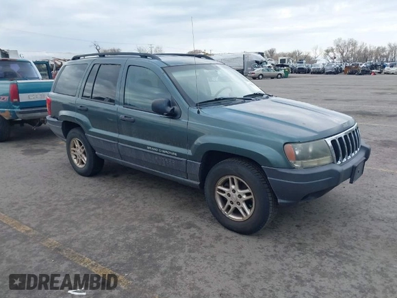 2003 Jeep Grand Cherokee Laredo with VIN 1J4GX48S03C536709, listed as a IAAI auction lot 41908946 with 240,435 mi miles. Bid and sale history available at carsss.com. Image 1.