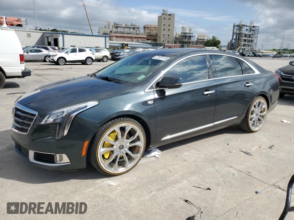 2018 Cadillac XTS Luxury z VIN 2G61M5S30J9135292, wystawiony jako Copart lot #57121115 z przebiegiem 95 110 mil mil oraz Szkoda całkowita • Salvage title. Historia ofert i sprzedaży dostępna na DreamBid. Obrazek 1.