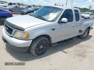 2003 Ford F-150 XL with VIN 1FTRX07W33KB50982, listed as a IAAI auction lot 42599811 with 271,009 mi miles and . Bid and sale history available at DreamBid. Image 2.