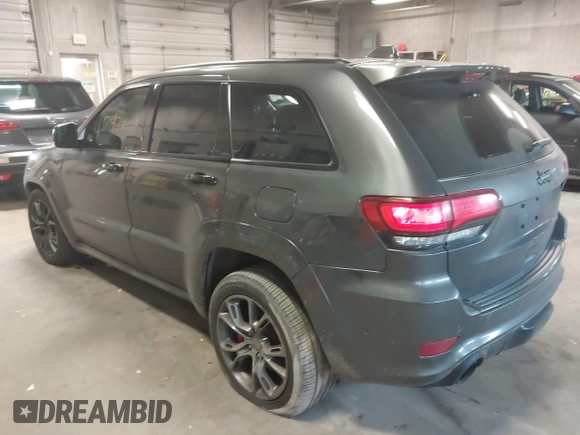 2018 Jeep Grand Cherokee SRT z VIN 1C4RJFDJ6JC432683, wystawiony jako IAAI lot #41971436 z przebiegiem 113 078 mil mil oraz . Historia ofert i sprzedaży dostępna na DreamBid. Obrazek 3.
