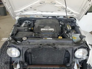 2016 Jeep Wrangler Unlimited Sahara with VIN 1C4BJWEGXGL310499, listed as a Copart auction lot 59756015 with 128,498 mi miles and Salvage title. Bid and sale history available at DreamBid. Image 11.