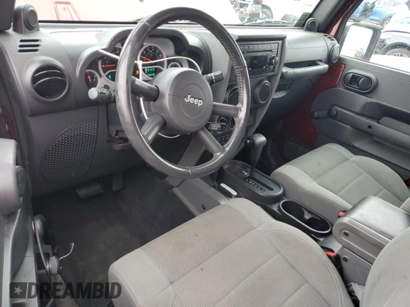 2007 Jeep Wrangler Rubicon с VIN 1J8GA64137L149019, выставлен на аукционе Copart как лот 56499575 с пробегом 146 230 миль миль и Списание • Salvage title. История ставок и продаж доступна на DreamBid. Изображение 8.