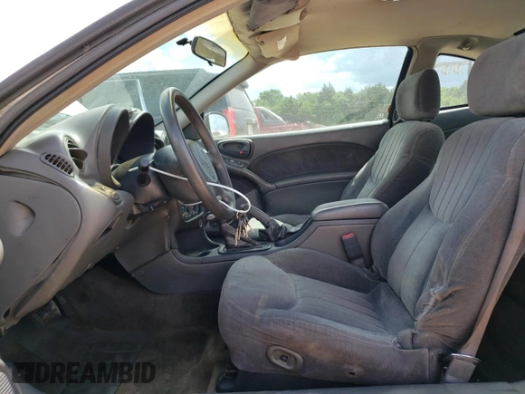 1999 Pontiac Grand Am z VIN 1G2NE12E3XM901263, wystawiony jako Copart lot #55723445 z przebiegiem 163 946 mil mil oraz Szkoda całkowita • Salvage title. Historia ofert i sprzedaży dostępna na DreamBid. Obrazek 7.