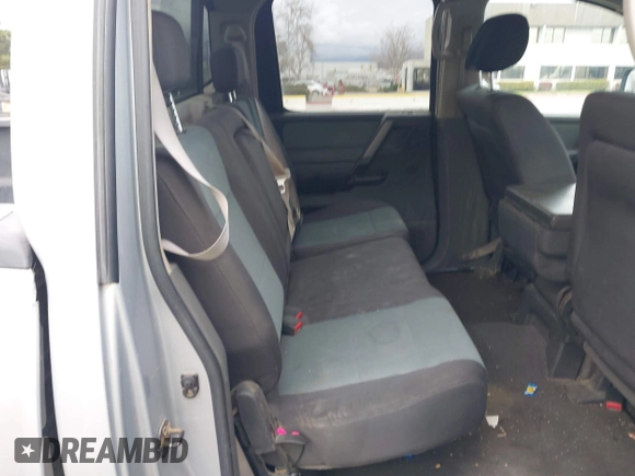 2005 Nissan Titan SE with VIN 1N6AA07B85N572434, listed as a IAAI auction lot 41526698 with 201,138 mi miles. Bid and sale history available at carsss.com. Image 8.