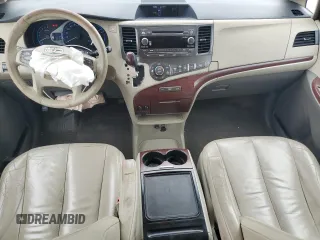 2012 Toyota Sienna XLE AAS с VIN 5TDYK3DC7CS207716, выставлен на аукционе Copart как лот 60592265 с пробегом 287 021 миль миль и Списание • Salvage title. История ставок и продаж доступна на DreamBid. Изображение 8.