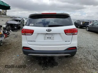 2017 Kia Sorento EX z VIN 5XYPH4A57HG301802, wystawiony jako Copart lot #55183885 z przebiegiem 128 064 mil mil oraz Szkoda całkowita • Salvage title. Historia ofert i sprzedaży dostępna na DreamBid. Obrazek 6.