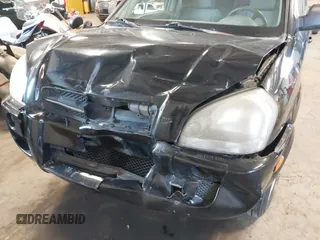 2006 Hyundai Tucson GL with VIN KM8JM12B96U252484, listed as a IAAI auction lot 42100855 with 273,655 mi miles. Bid and sale history available at carsss.com. Image 6.