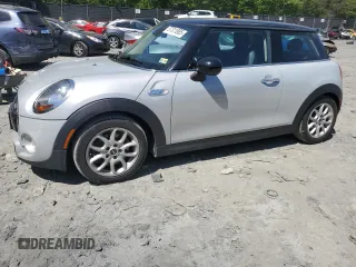 2015 MINI Hardtop S z VIN WMWXP7C58F2A39586, wystawiony jako Copart lot #57311885 z przebiegiem 123 173 mil mil oraz Szkoda całkowita • Salvage title. Historia ofert i sprzedaży dostępna na DreamBid. Obrazek 1.