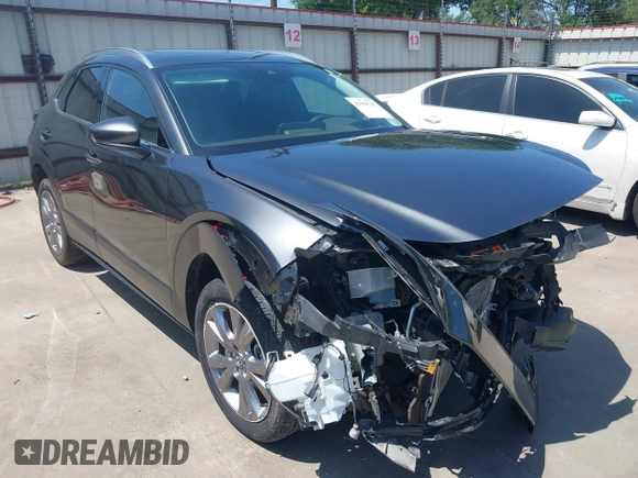 2022 Mazda CX-30 S Premium with VIN 3MVDMBDL5NM416649, listed as a IAAI auction lot 41990745 with 13,923 mi miles and . Bid and sale history available at DreamBid. Image 1.