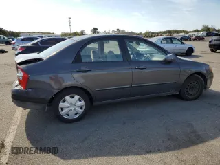 2006 Kia Spectra EX with VIN KNAFE122X65270684, listed as a Copart auction lot 73002454 with 79,326 mi miles and Salvage Title. Bid and sale history available at carsss.com. Image 3.