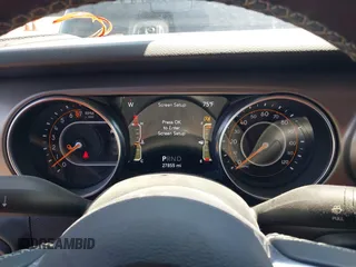 2020 Jeep Gladiator Sport S with VIN 1C6HJTAGXLL123540, listed as a IAAI auction lot 42453999 with 27,855 mi miles and . Bid and sale history available at DreamBid. Image 7.