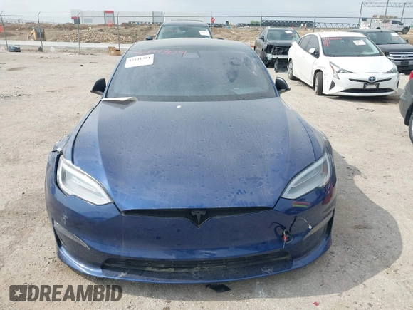 2021 Tesla Model S Plaid with VIN 5YJSA1E64MF442036, listed as a IAAI auction lot 42141304 with 24,998 mi miles and . Bid and sale history available at DreamBid. Image 11.
