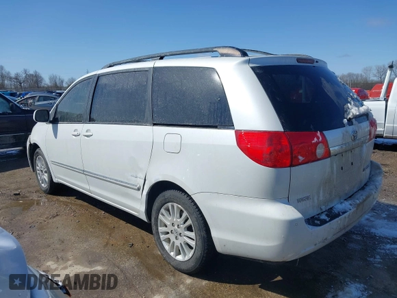 2008 Toyota Sienna XLE with VIN 5TDZK22C18S174818, listed as a IAAI auction lot 41906039 with 249,182 mi miles. Bid and sale history available at carsss.com. Image 3.