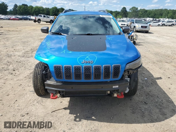 2019 Jeep Cherokee Trailhawk with VIN 1C4PJMBX0KD311114, listed as a Copart auction lot 58799765 with 60,833 mi miles and Salvage title. Bid and sale history available at DreamBid. Image 5.