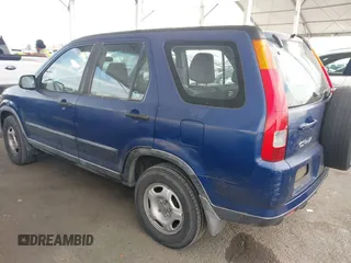 2004 Honda CR-V LX with VIN JHLRD684X4C023539, listed as a IAAI auction lot 42032809 with 186,056 mi miles and . Bid and sale history available at carsss.com. Image 3.