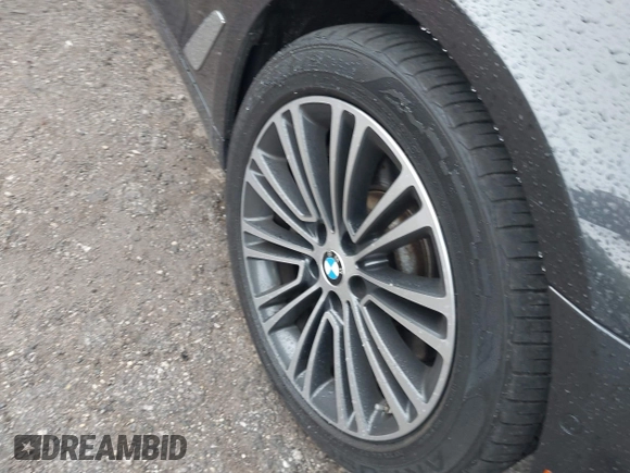 2018 BMW 5 Series 540i xDrive with VIN WBAJE7C59JWC55346, listed as a IAAI auction lot 42300109 with 107,868 mi miles and . Bid and sale history available at DreamBid. Image 12.