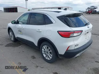 2020 Ford Escape SE with VIN 1FMCU9G67LUC31633, listed as a IAAI auction lot 42173290 with 136,937 mi miles and . Bid and sale history available at DreamBid. Image 3.