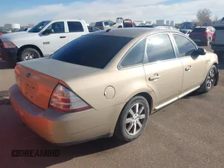 2008 Ford Taurus SEL with VIN 1FAHP24W38G111319, listed as a IAAI auction lot 41585092 with 216,419 mi miles. Bid and sale history available at carsss.com. Image 4.