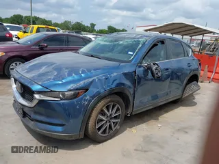 2018 Mazda CX-5 Touring z VIN JM3KFACM5J1442416, wystawiony jako IAAI lot #42093137 z przebiegiem 65 102 mil mil oraz . Historia ofert i sprzedaży dostępna na DreamBid. Obrazek 18.
