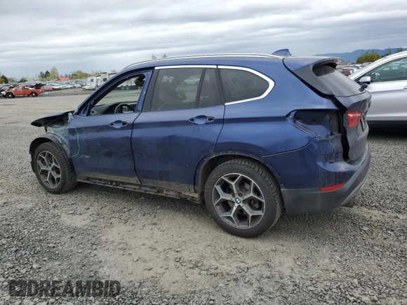 2016 BMW X1 xDrive28i with VIN WBXHT3C33G5E49242, listed as a Copart auction lot 51947625 with 105,538 mi miles and Salvage Title. Bid and sale history available at carsss.com. Image 2.