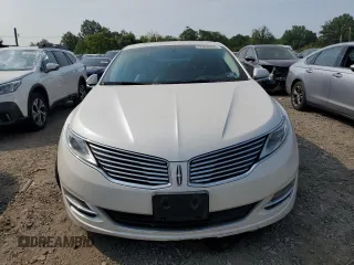 2015 Lincoln MKZ z VIN 3LN6L2GK9FR622783, wystawiony jako Copart lot #59892995 z przebiegiem 174 209 mil mil oraz Szkoda całkowita • Salvage title. Historia ofert i sprzedaży dostępna na DreamBid. Obrazek 5.