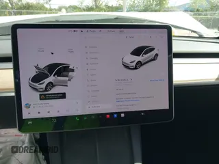 2021 Tesla Model Y Long Range z VIN 5YJYGDEE2MF200315, wystawiony jako IAAI lot #42233599 z przebiegiem 38 742 mil mil oraz . Historia ofert i sprzedaży dostępna na DreamBid. Obrazek 7.