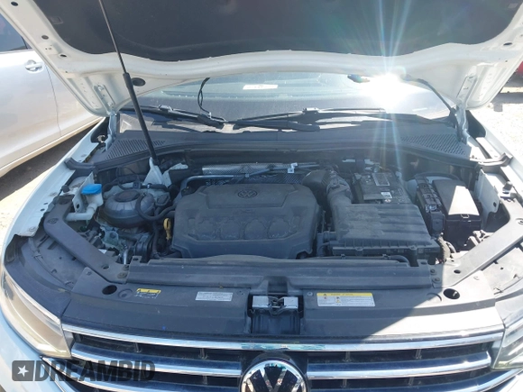 2022 Volkswagen Tiguan SE with VIN 3VV3B7AX7NM032705, listed as a IAAI auction lot 41987713 with 34,010 mi miles and . Bid and sale history available at DreamBid. Image 10.