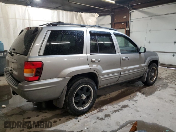 2001 Jeep Grand Cherokee Limited with VIN 1J4GW58N91C664611, listed as a Copart auction lot 53330755 with 212,479 mi miles and Salvage Title. Bid and sale history available at carsss.com. Image 3.