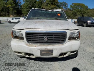 1999 Cadillac Escalade z VIN 1GYEK13R8XR411548, wystawiony jako Copart lot #75803424 z przebiegiem 277 712 mil mil oraz Szkody całkowita. Historia ofert i sprzedaży dostępna na DreamBid. Obrazek 5.
