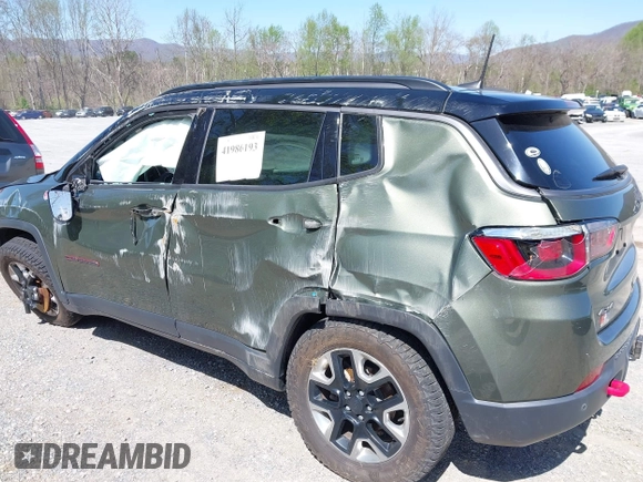 2018 Jeep Compass Trailhawk with VIN 3C4NJDDB0JT241163, listed as a IAAI auction lot 41986193 with 89,246 mi miles and . Bid and sale history available at DreamBid. Image 12.