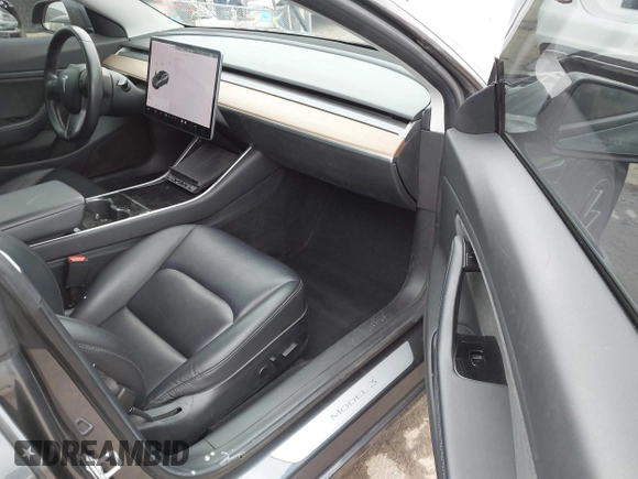 2018 Tesla Model 3 Long Range Battery with VIN 5YJ3E1EA0JF101564, listed as a IAAI auction lot 41902214 with 101,581 mi miles. Bid and sale history available at carsss.com. Image 5.