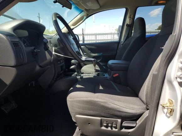 2004 Jeep Grand Cherokee Laredo with VIN 1J4GW48S34C430923, listed as a Copart auction lot 53742105 with 194,372 mi miles and Salvage Title. Bid and sale history available at carsss.com. Image 7.