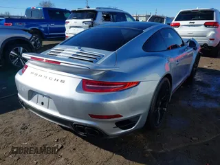 2016 Porsche 911 Turbo S with VIN WP0AD2A93GS166450, listed as a IAAI auction lot 41301144 with 23,420 mi miles. Bid and sale history available at carsss.com. Image 4.