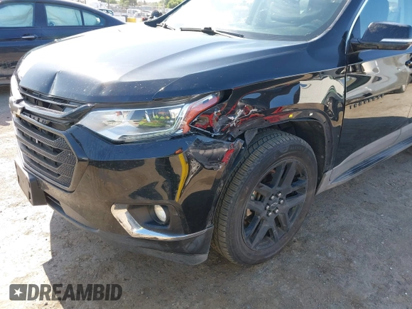 2019 Chevrolet Traverse LT Cloth z VIN 1GNEVGKW7KJ208656, wystawiony jako IAAI lot #42373422 z przebiegiem 132 863 mil mil oraz . Historia ofert i sprzedaży dostępna na DreamBid. Obrazek 6.