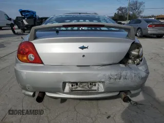 2003 Hyundai Tiburon GT z VIN KMHHN65F13U102985, wystawiony jako Copart lot #45294325 z przebiegiem 326 919 mil mil oraz Szkoda całkowita • Salvage title. Historia ofert i sprzedaży dostępna na DreamBid. Obrazek 6.
