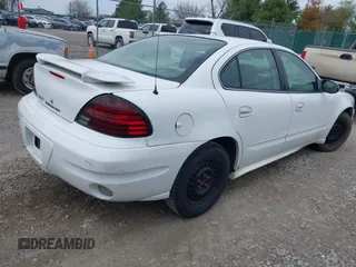 2005 Pontiac Grand Am SE with VIN 1G2NE52E95M191936, listed as a IAAI auction lot 41940665 with 247,461 mi miles. Bid and sale history available at carsss.com. Image 4.