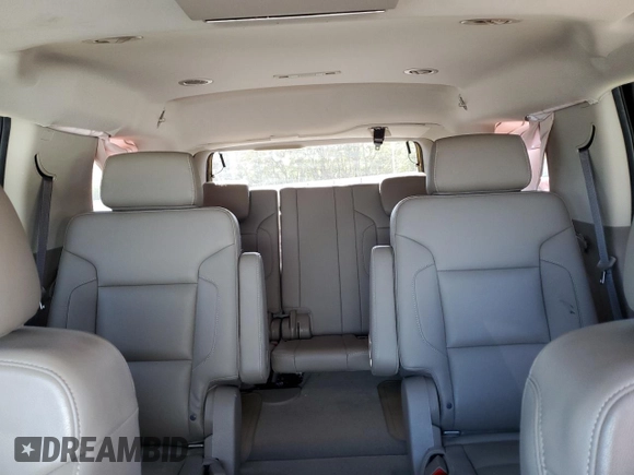 2020 Chevrolet Tahoe LT z VIN 1GNSKBKC7LR124845, wystawiony jako Copart lot #53354715 z przebiegiem Nie podano mil oraz Szkoda całkowita • Salvage title. Historia ofert i sprzedaży dostępna na DreamBid. Obrazek 10.