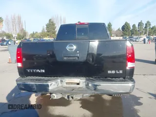2004 Nissan Titan SE with VIN 1N6AA06A14N574940, listed as a IAAI auction lot 41821005 with 202,373 mi miles. Bid and sale history available at carsss.com. Image 16.