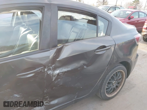 2011 Mazda 3 S Grand Touring with VIN JM1BL1W54B1363052, listed as a IAAI auction lot 41696177 with 143,852 mi miles and . Bid and sale history available at DreamBid. Image 12.