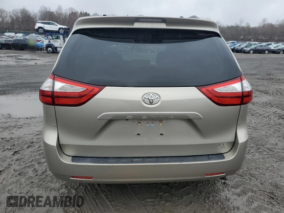 2017 Toyota Sienna LE with VIN 5TDJZ3DC8HS149992, listed as a Copart auction lot 51878725 with 90,299 mi miles and Salvage title. Bid and sale history available at DreamBid. Image 6.