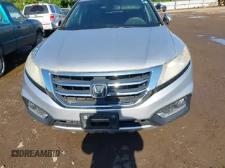 2013 Honda Crosstour EX-L z VIN 5J6TF2H56DL002499, wystawiony jako IAAI lot #42349382 z przebiegiem 174 542 mil mil oraz . Historia ofert i sprzedaży dostępna na DreamBid. Obrazek 12.