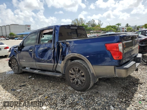 2017 Nissan Titan SL with VIN 1N6AA1E6XHN536129, listed as a Copart auction lot 60496415 with 132,269 mi miles and Salvage title. Bid and sale history available at DreamBid. Image 2.