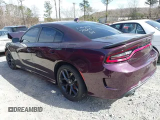 2021 Dodge Charger GT with VIN 2C3CDXHG4MH667025, listed as a IAAI auction lot 41602696 with 77,503 mi miles and . Bid and sale history available at DreamBid. Image 3.