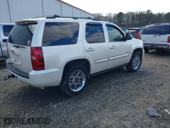 2008 Chevrolet Tahoe LTZ with VIN 1GNFC13J18R263835, listed as a IAAI auction lot 41415381 with 308,477 mi miles and . Bid and sale history available at DreamBid. Image 4.